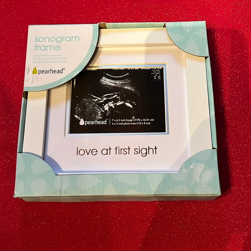 Pearhead Sonogram frame with wording “Love at first sight”. New in box.
